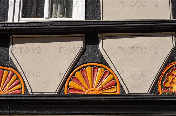 Fan rosettes on historic half-timbered architecture in the town centre of Bad Frankenhausen