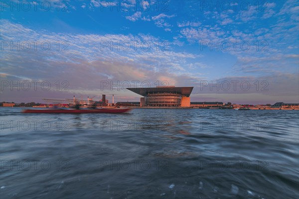 Water canal with opera house in background