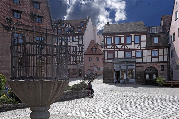 Historic bagpiper fountain on the Unschlittplkatz. Nuremberg