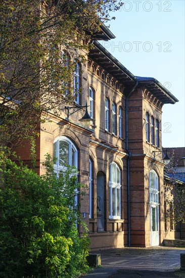 Historic brick building behind the former sulphur bathhouse