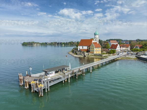 Aerial view of the moated castle peninsula on Lake Constance with the baroque church of St. George