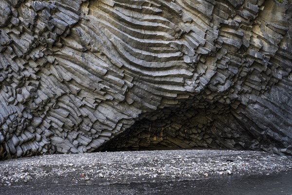 Rock formations of basalt and lava rock in the river park Gole dell' Alcantara