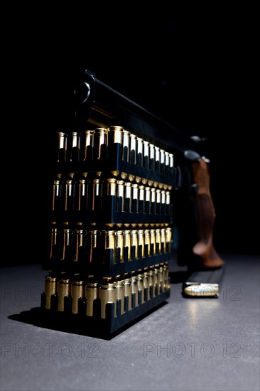 Elegant Semiautomatic 9mm Handgun Leaning on Bullet Ammunition in Switzerland