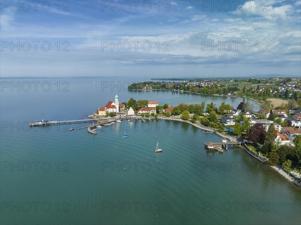 Aerial view of the moated castle peninsula on Lake Constance with the baroque church of St. George