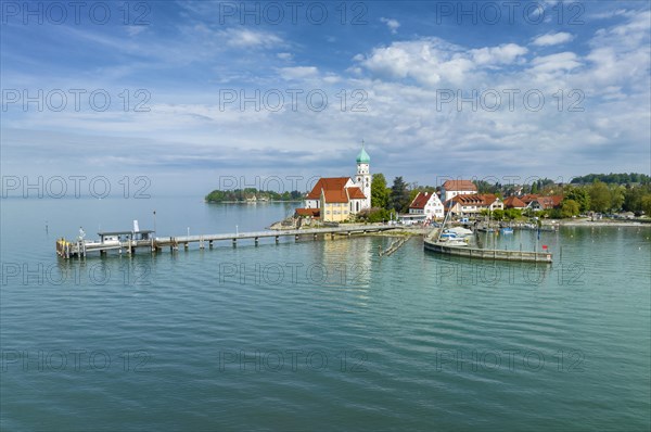 Aerial view of the moated castle peninsula on Lake Constance with the baroque church of St. George