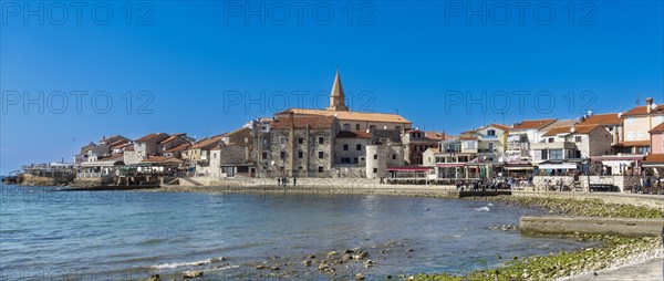 Beach and city view of the coastal town of Umag