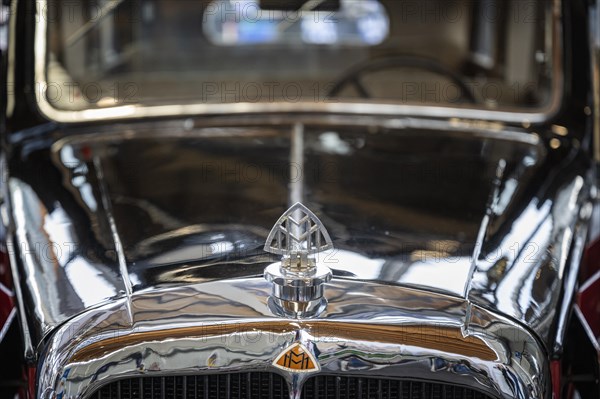 Close-up with brand emblem of a Maybach classic car type SW38 year of construction 1938