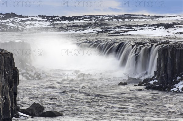 Selfoss waterfall on the river Joekulsa a Fjoellum in in the Joekulsargljufur canyon in winter