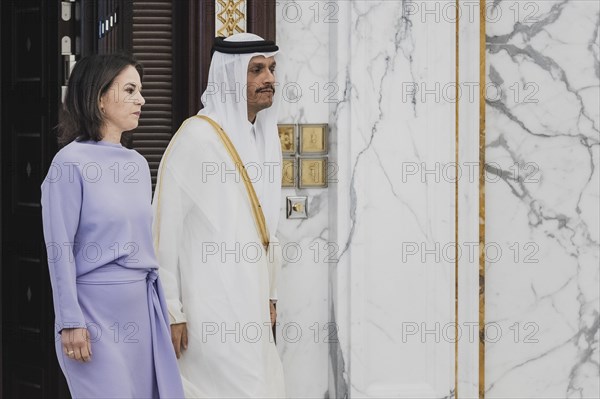 (L-R) Annalena Baerbock (Buendnis 90 Die Gruenen), Federal Minister for Foreign Affairs, photographed in front of signing a Memorandum of Understanding with Sheikh Mohammed bin Abdulrahman bin Jassim Al Thani, Prime Minister and Minister of Foreign Affairs of Qatar, in Doha, 17 May 2023. Baerbock is travelling to Saudi Arabia and Qatar during her three-day trip., Doha, Qatar, Asia