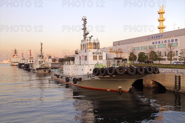 Tugboats at Japan Coast Guard Station in Yokohama port Kanagawa Japan Asia