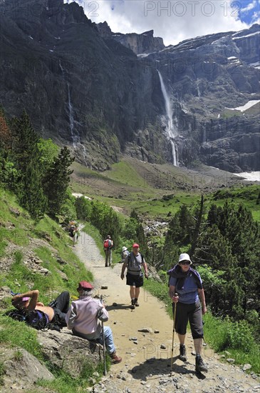 Tourists visiting the Cirque de Gavarnie and the Gavarnie Falls