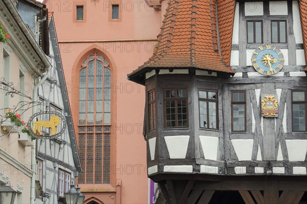 Historic town hall with clock and oriel