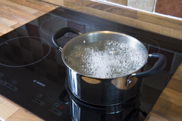 Two handled pot with boiling water