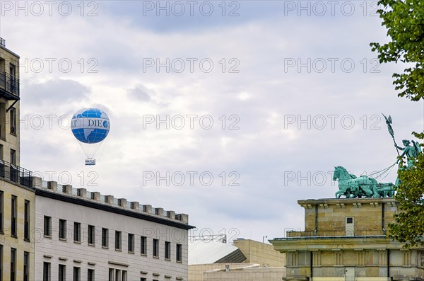 Roman Quadriga with Germania on the Brandenburg Gate and tethered balloon DIE WELT as viewing platform