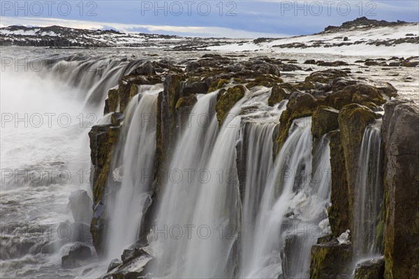 Selfoss waterfall on the river Joekulsa a Fjoellum in in the Joekulsargljufur canyon in winter