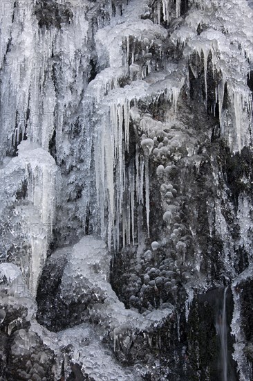 Frozen Radau waterfall in winter near Bad Harzburg