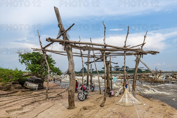 Wooden tripods with baskets attached