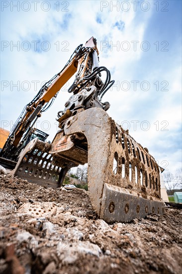 Excavator grab on construction site