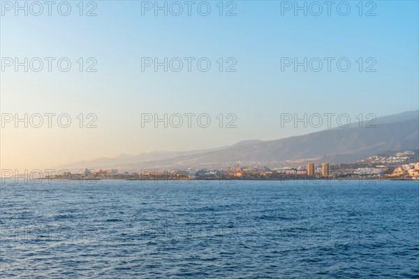 Tenerife ferry heading to Hierro or La Gomera. View from the boat of Los Cristianos and the island of Tenerife