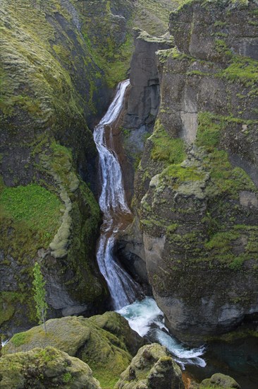 Waterfall on the Fjaora river flowing through the Fjaorargljufur