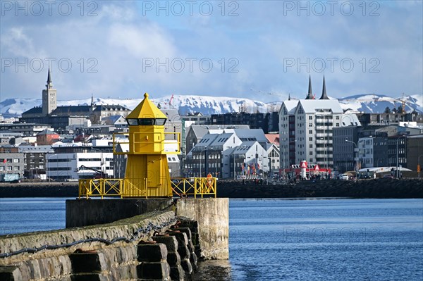 View from the old harbour of a lighthouse