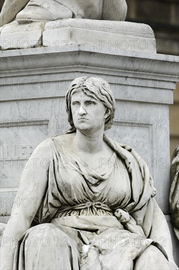 Statue of a woman outside Gendarmenmarkt Berlin Germany