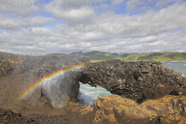 Rainbow and natural arch