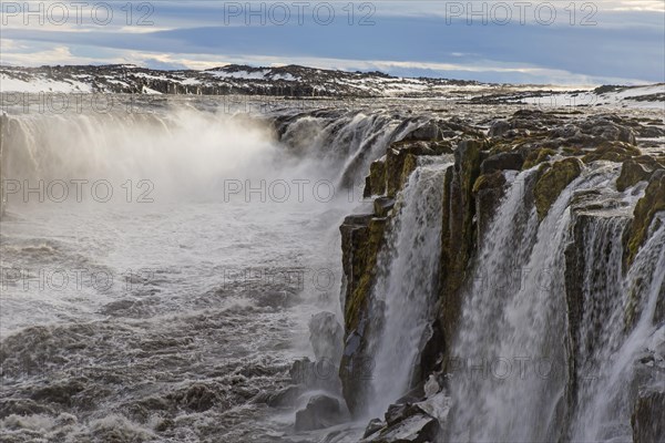 Selfoss waterfall on the river Joekulsa a Fjoellum in in the Joekulsargljufur canyon in winter