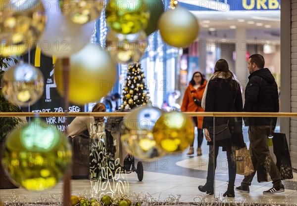 Christmas shopping under festive decorations