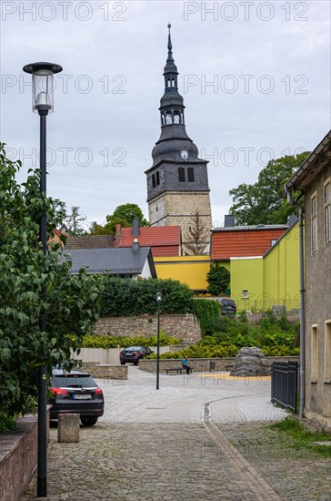 Street view in the upper town with a view to the 56 m high tower of the Oberkirche