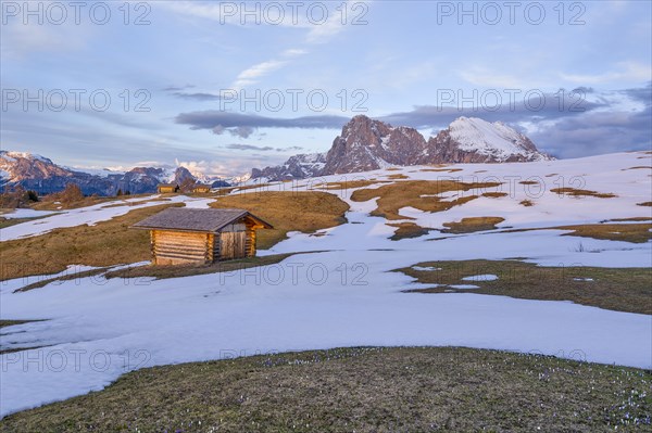 Alpine hut in the last sunlight