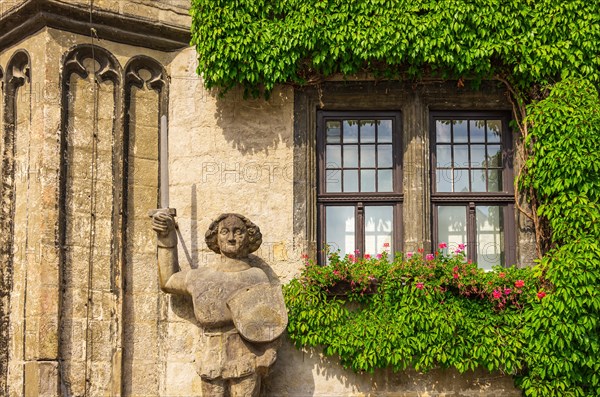 The famous Roland on the south-west corner of the medieval town hall on the historic market square of Quedlinburg