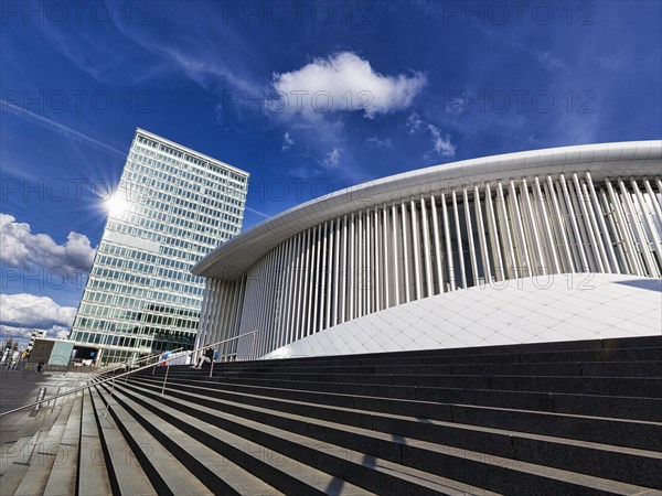 White concert hall with staircase