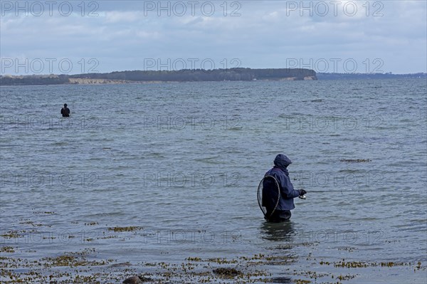 Anglers standing in the water