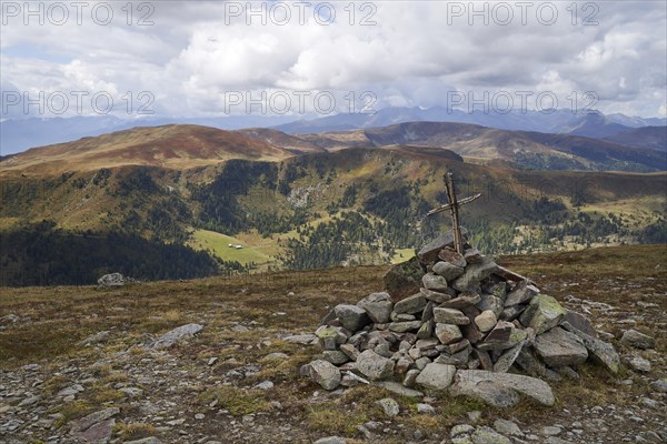 Summit cross on the Kloeling in the Lungau Biosphere Park