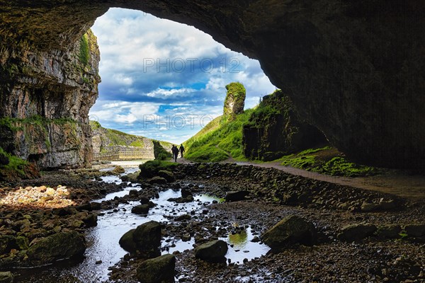 Visitors in the cave entrance