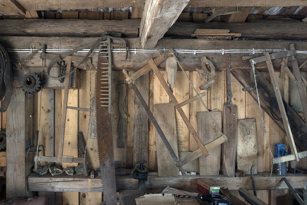 Tool wall in a historic sawmill built in 1870