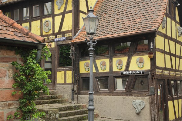 Artistic elephant house by Ulrich Seidenburg with inscription and street lamp