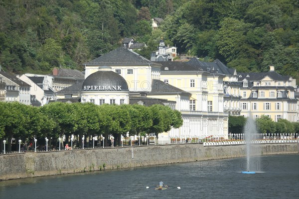 Baroque UNESCO Casino and riverside promenade on the Lahn with fountain