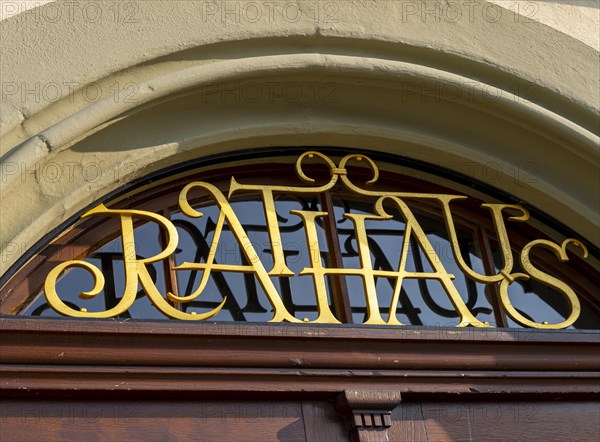 Town hall lettering above the door of the town hall of the municipality of Mittelzell next to the Minster of St. Maria and Markusl on the island of Reichenau in Lake Constance