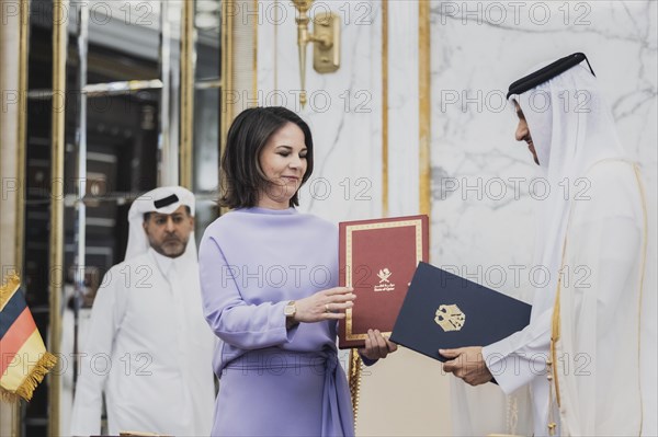 (L-R) Annalena Baerbock (Buendnis 90 Die Gruenen), Federal Minister for Foreign Affairs, pictured signing a Memorandum of Understanding with Sheikh Mohammed bin Abdulrahman bin Jassim Al Thani, Prime Minister and Minister of Foreign Affairs of Qatar, in Doha, 17.05.2023. Baerbock is travelling on her three-day trip to Saudi Arabia and to Qatar., Doha, Qatar, Asia