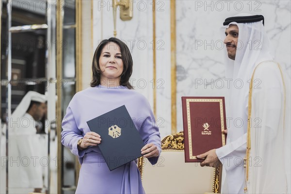 (L-R) Annalena Baerbock (Buendnis 90 Die Gruenen), Federal Minister for Foreign Affairs, pictured signing a Memorandum of Understanding with Sheikh Mohammed bin Abdulrahman bin Jassim Al Thani, Prime Minister and Minister of Foreign Affairs of Qatar, in Doha, 17.05.2023. Baerbock is travelling on her three-day trip to Saudi Arabia and to Qatar., Doha, Qatar, Asia