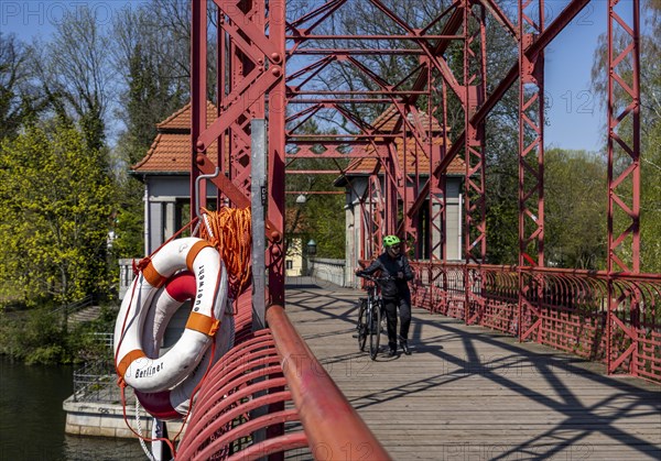 Berlin Fire Brigade lifebuoy on red bridge railing