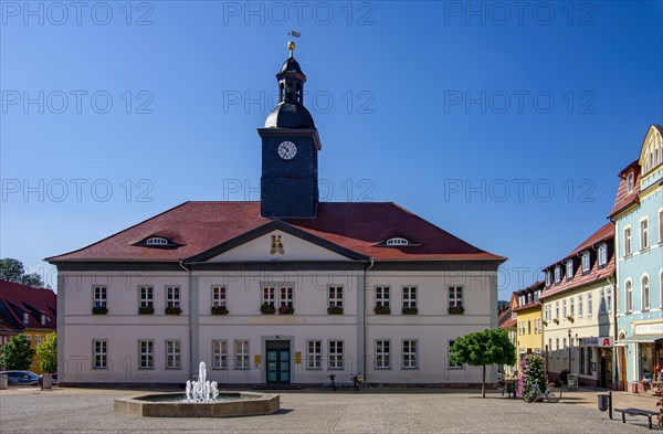 Urban scene in front of the historic town hall at the market