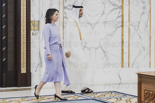 (L-R) Annalena Baerbock (Buendnis 90 Die Gruenen), Federal Minister for Foreign Affairs, photographed in front of signing a Memorandum of Understanding with Sheikh Mohammed bin Abdulrahman bin Jassim Al Thani, Prime Minister and Minister of Foreign Affairs of Qatar, in Doha, 17 May 2023. Baerbock is travelling to Saudi Arabia and Qatar during her three-day trip., Doha, Qatar, Asia