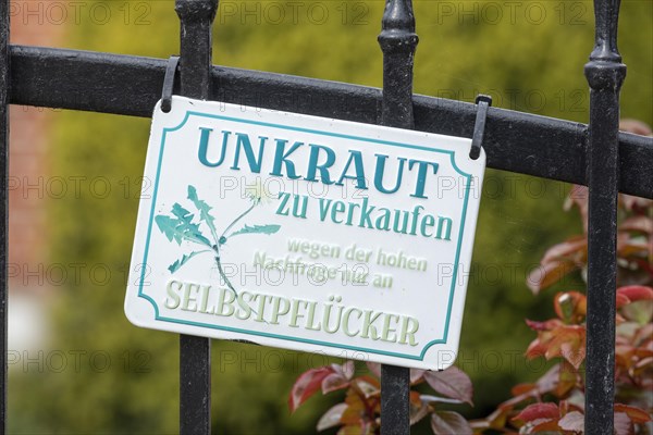 Joking sign offers weeds for sale