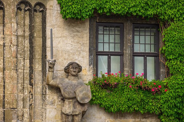 The famous Roland on the south-west corner of the medieval town hall on the historic market square of Quedlinburg