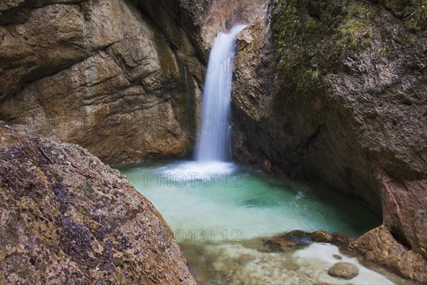 Waterfall in the river Almbach running through the Almbachklamm canyon in the Berchtesgaden Alps