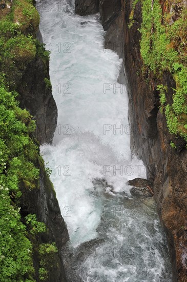 Waterfall running through narrow gorge at the Pont d'Espagne in the Hautes-Pyrenees near Cauterets