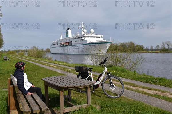 Cruise ship Deutschland sails from Kiel to Brunsbuettel in the Kiel Canal